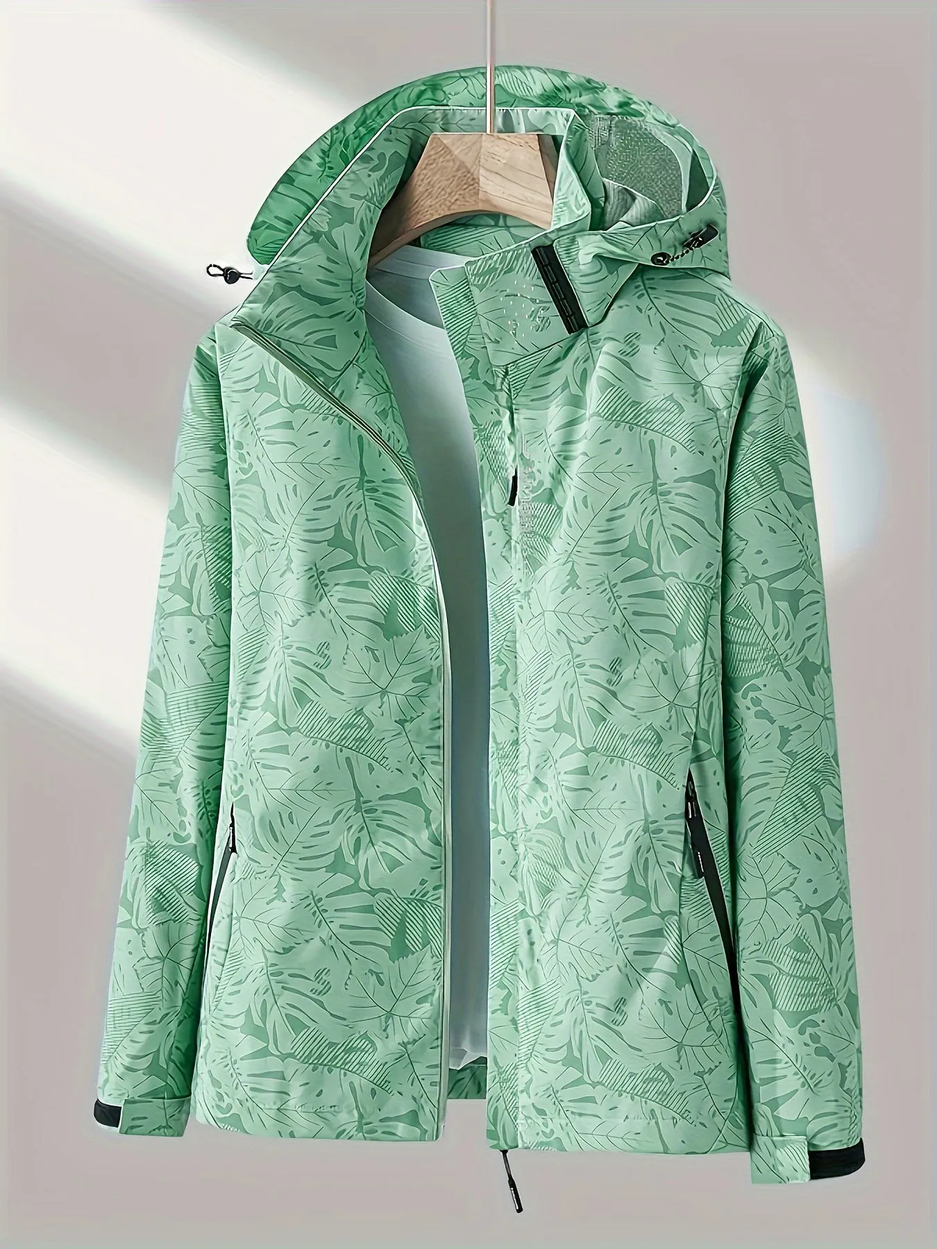 Stylish Leaf Print Windbreaker Jacket - Waterproof, Breathable, and Packable - Women's Outdoor Rain Jacket with Removable Hood and Adjustable Cuffs for Hiking, Camping, and Travel